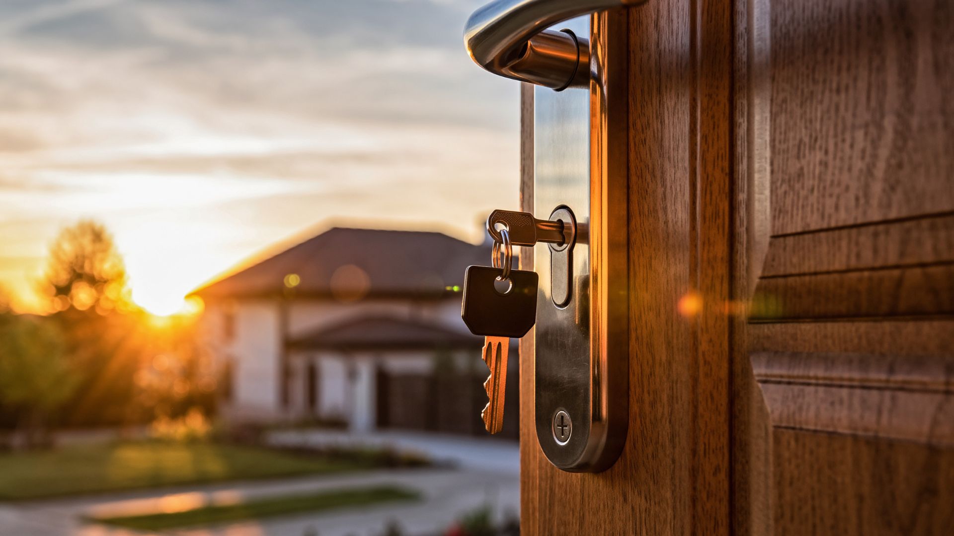 House key in a front door lock, symbolizing legal responsibilities and what happens if you miss jury duty